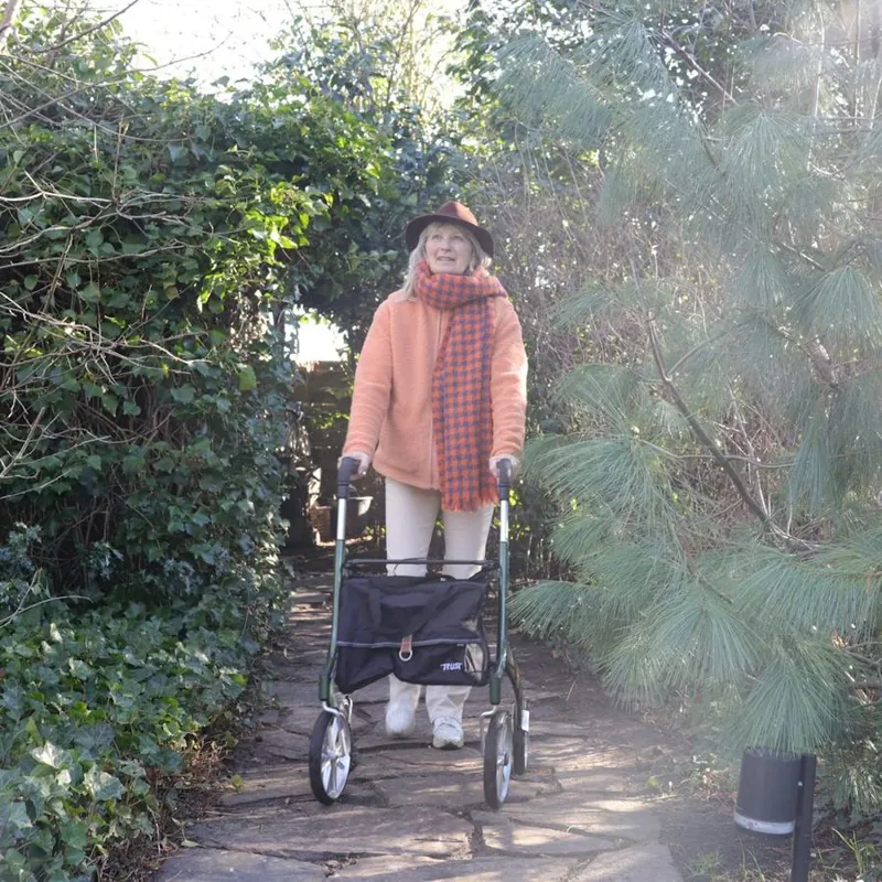 An older woman relaxed and independent at home